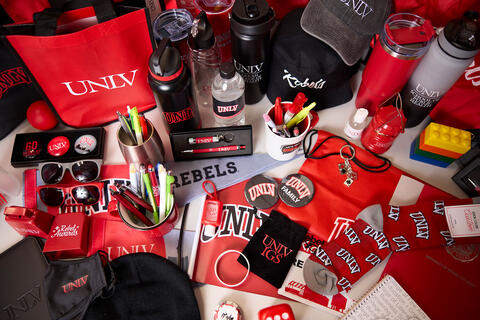 A various of U-N-L-V themed items and swag