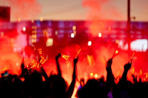 Outdoor concert with red lights