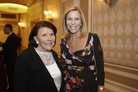 Joyce Mack and her daughter Marilynn smile for a photo