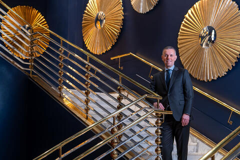 man standing on staircase