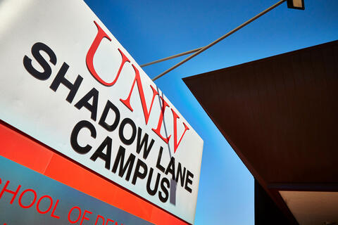 A sign in front of a building reads "UNLV Shadow Lane Campus"