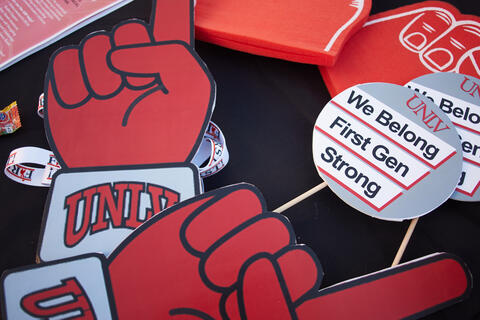 cutouts and signs that say we belong first gen strong