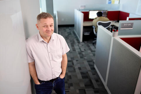 Andy Stefik inside a computer lab
