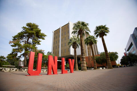 UNLV letters in front of FDH building outside
