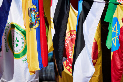 A mix of international flags