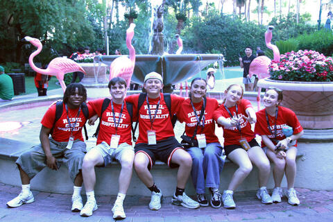 group of high school students wearing Rebel Hospitality shirts