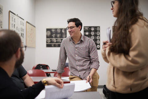 A personal talking to a team of two people