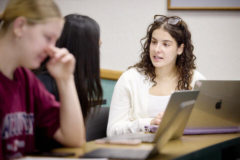 Two students talking to each other