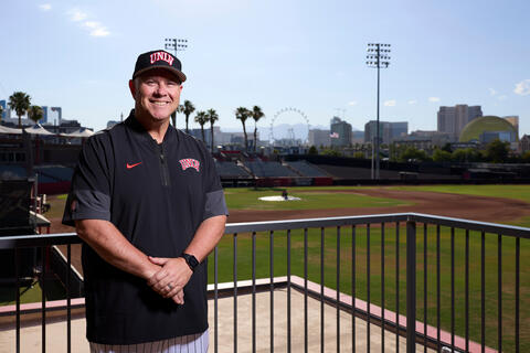 Baseball Coach Nick Garritano in front of field with Vegas Strip in background