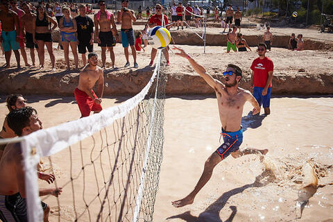 Group of people playing oozeball