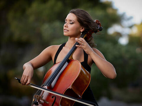 A woman playing a cello