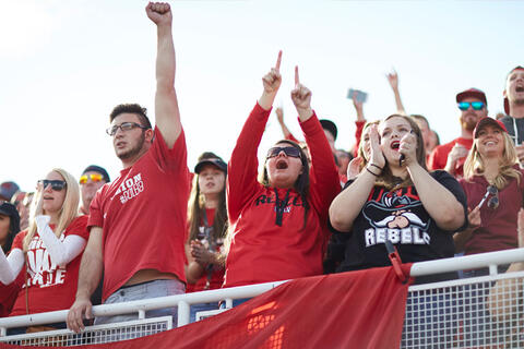 A crowd of people cheering