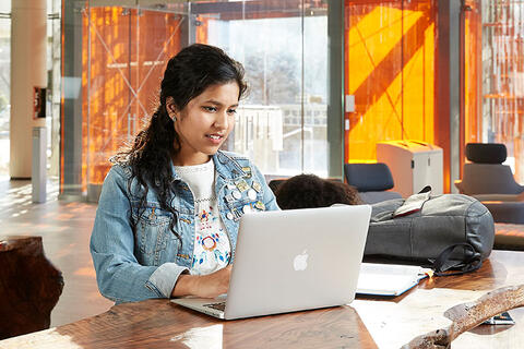 A woman with a laptop