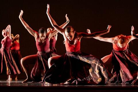 Fine Arts students performing in a dance in the Performing Arts Center.