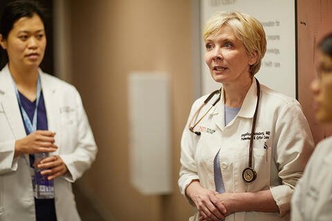 Women in white coats.