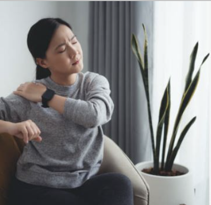 A woman practicing muscle relaxation