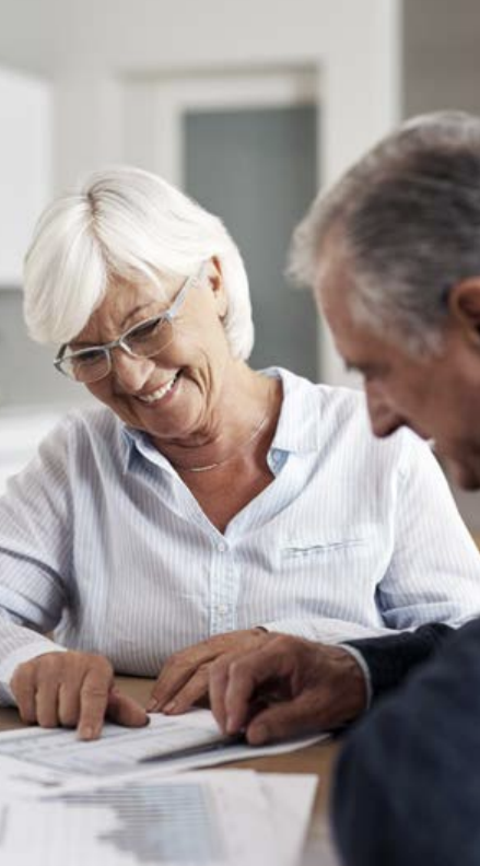 A man and woman going over paperwork