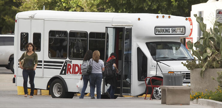 Students boarding the parking shuttle