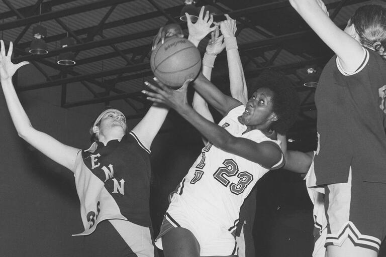 Belinda Candler fights her way to a layup