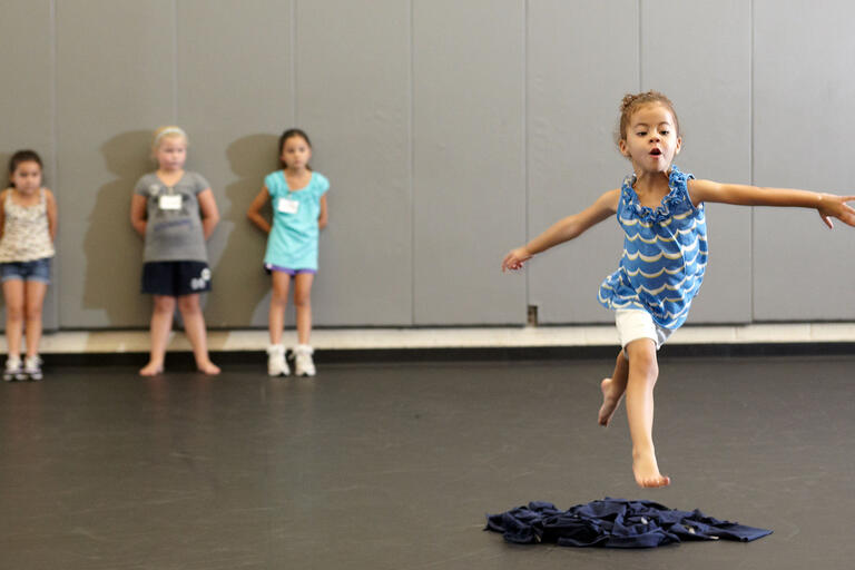 Group of young girls dancing.