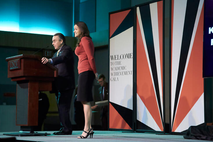 Woman speaking at a podium