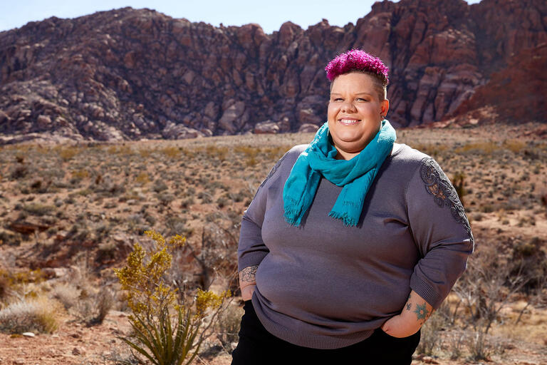 Ashlyn Gray poses in front of Calico Basin in Red Rock