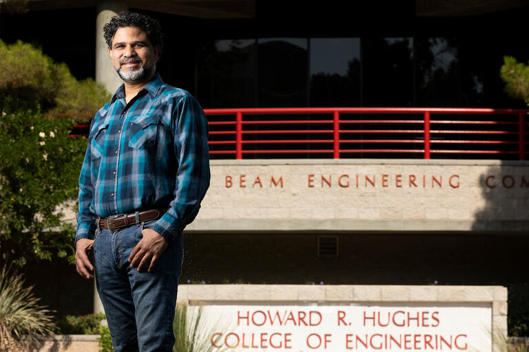 Haroon Stephen stands in front of the Engineering Complex.
