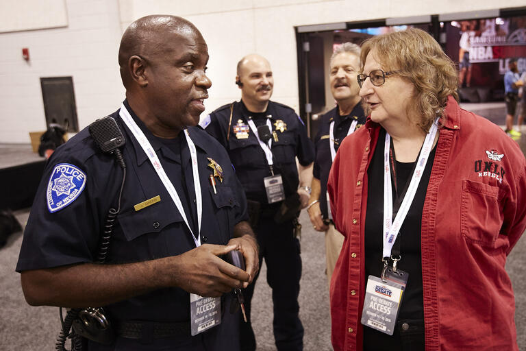 UNLV Police Lt. Jeff Green and Lori Temple, vice provost for information technology, discuss Presidential Debate security