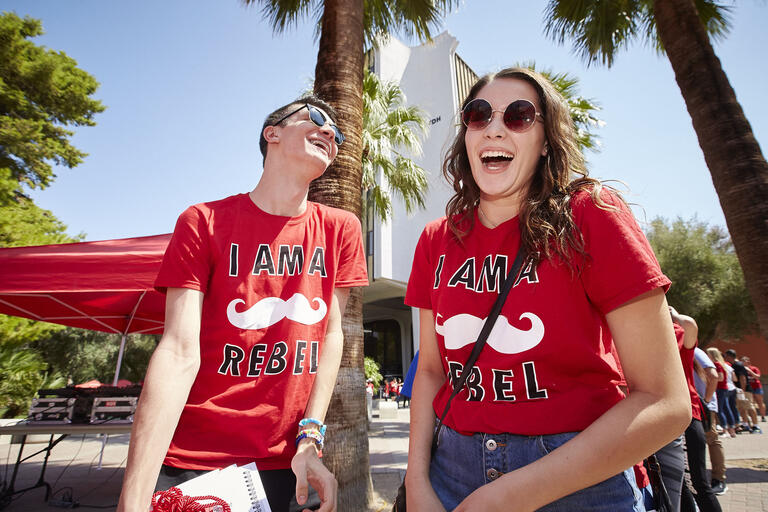 Two students wearing &quot;I am a rebel&quot; t-shirts