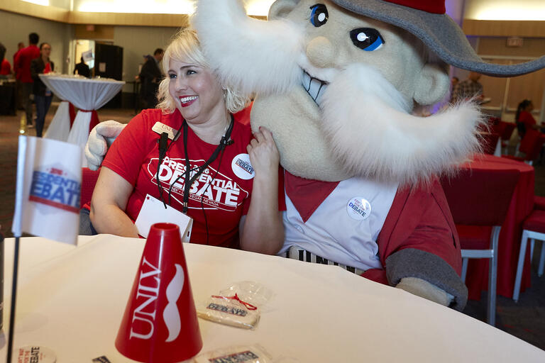Stephanie Reahm enjoys a moment with Hey Reb! at the watch event in the Student Union