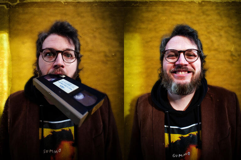 A man eats a VHS cassette