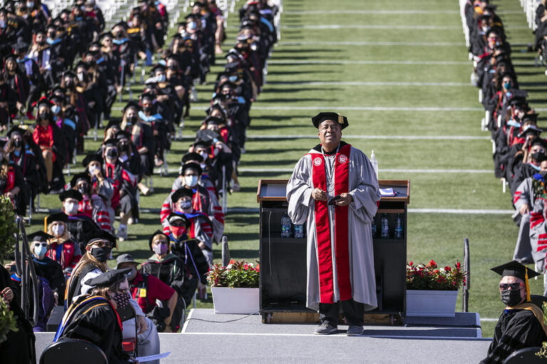 graduates at outdoor commencement