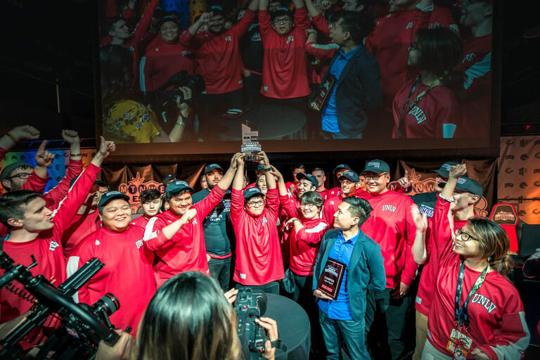 team holding trophy