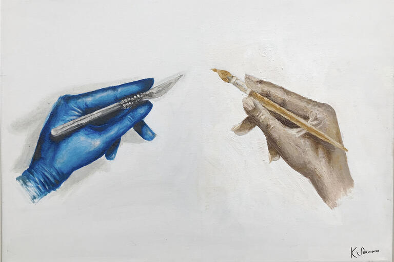 Hands holding a scalpel and a pen