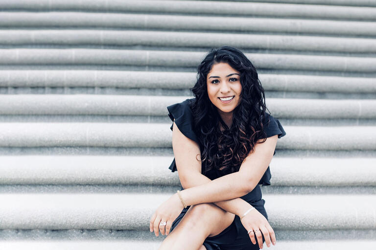 Ingrid Zarate Albarran sitting on stairs