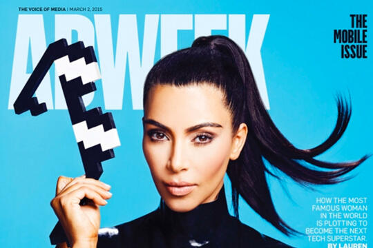 Cover of Ad Week magazine featuring Kim Kardashian holding a pair of pixelated sun glasses