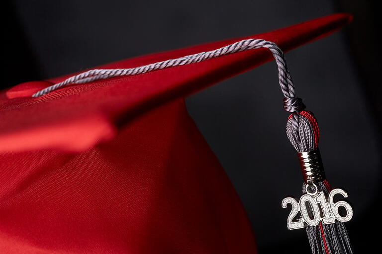 cloesup of commencement cap and 2016 tassle