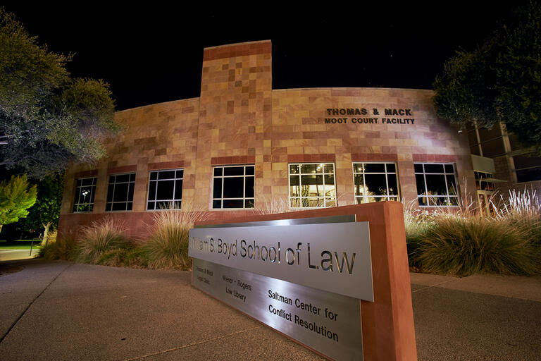 Boyd School of Law building pictured at night.