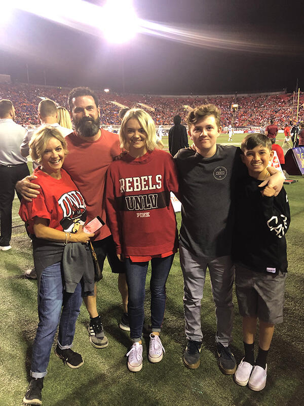 Photo of family in a stadium