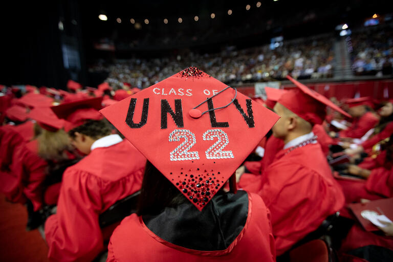 Decorated student grad cap during Spring 2022 commencement