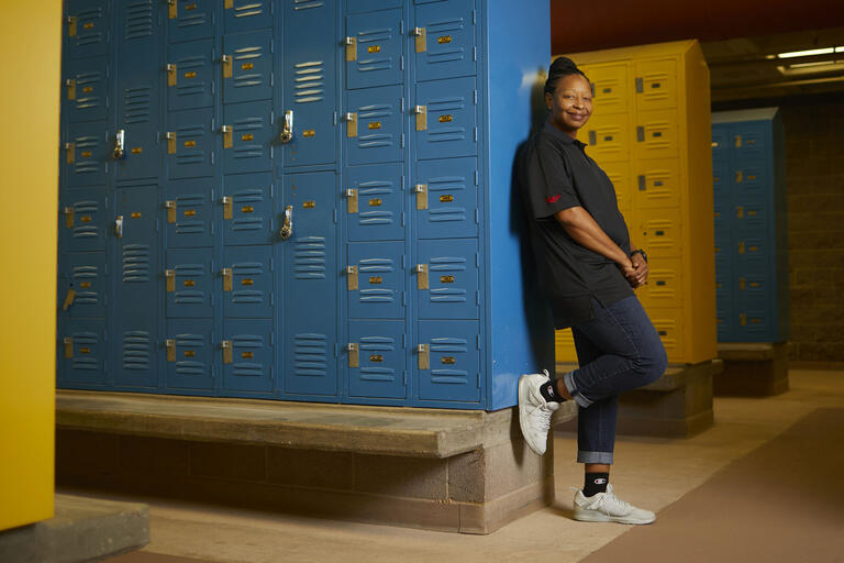 woman posing in lockerroom
