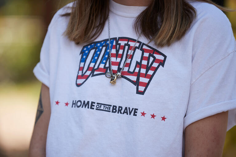 women wearing t-shirt that says UNLV Home of the Brave