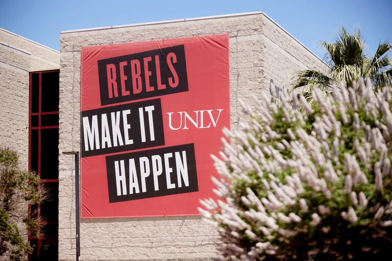 campus signage that reads rebels make it happen
