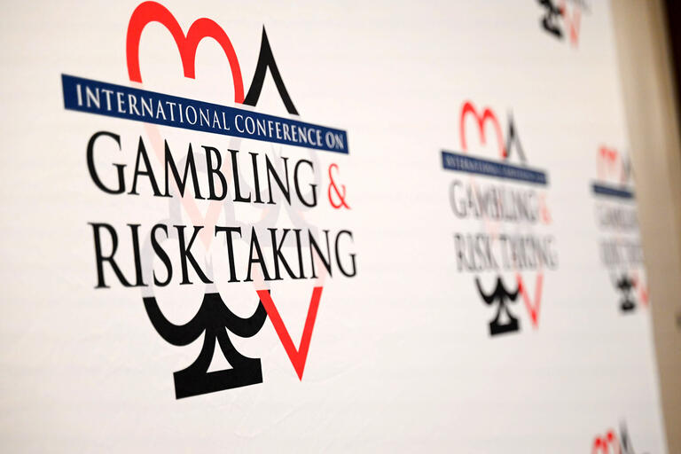 sign saying "Gaming & Risk Taking"