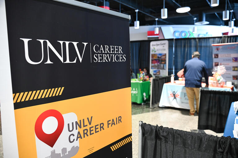 sign that reads unlv career services and career fair