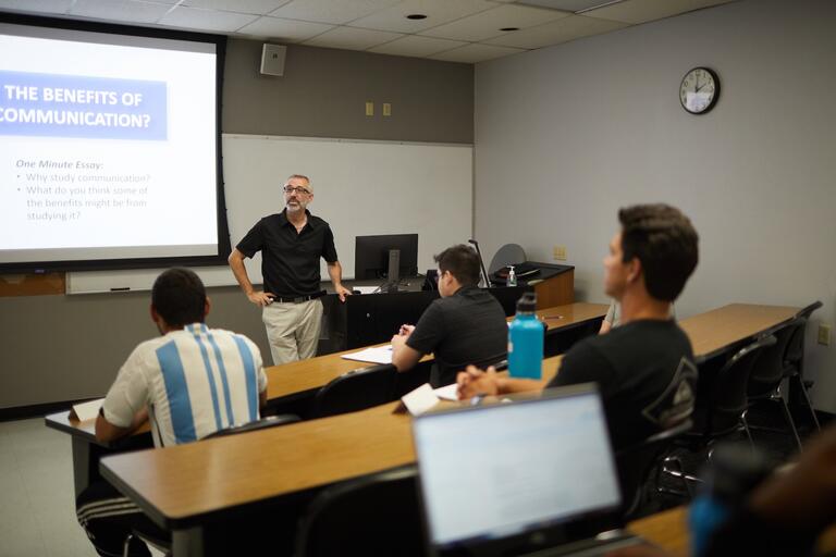 Jeffrey T. Child, Ph.D. Professor &amp; Chair of the Communications Studies department teaches a class on Human Communication Theory.