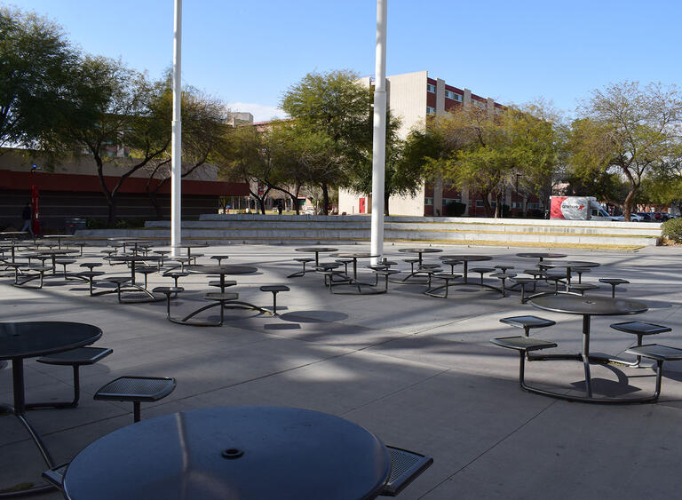 large concrete patio with shaded seating