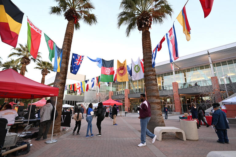 Pida Plaza decorated with various flags and booths during Minority Serving Institution (MSI) week.