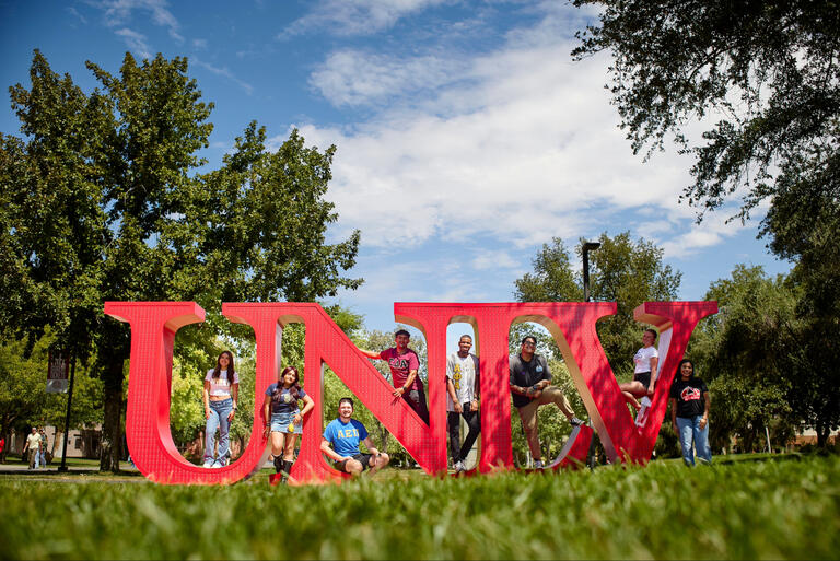 Fraternity and Sorority Life students on the UNLV mall letters.