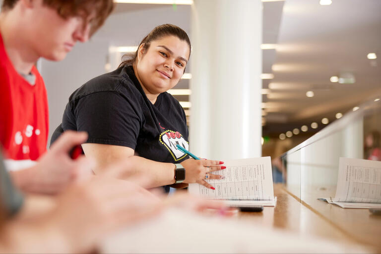 A student studies on campus.